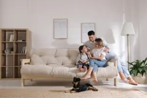 Family sitting on a couch.